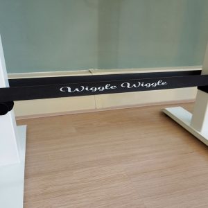 wiggle wiggle elastische band onder bureau